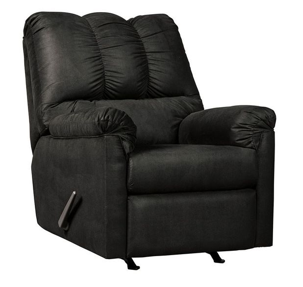 Full shot of a black recliner chair.    The chair has a dark, possibly black, fabric upholstery.  The back and cushions have a textured, slightly tufted appearance.    The armrests are well-padded and upholstered in the same material as the rest of the chair.    The chair has a rocking/gliding base.    Reclining mechanisms are visible, and the chair likely reclines and/or rocks.    The chair is presented against a plain white background, which allows the chair's color and design to stand out.