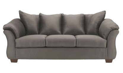 A three-seat couch, presented in a muted gray or taupe color.  The upholstery appears to be a smooth, possibly fabric-like material.  The couch has gently curved armrests and a slightly raised back, creating a comfortable and visually appealing profile.  The cushions are plump and appear to be well-filled.  The couch's legs are a dark, likely brown or espresso, wood tone. The couch is presented against a plain white background, focusing solely on the furniture piece.