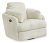 A plush, oversized swivel recliner chair upholstered in thick, vertical cream-colored corduroy fabric. The chair features generously padded armrests, a deep cushioned seat, and an extra-wide backrest with rounded, overstuffed edges for maximum comfort. A black manual reclining lever is visible on the right side (when facing the chair), allowing the footrest to extend. The base is a concealed swivel mechanism with a subtle black edge, enabling 360-degree rotation. The overall design is modern, cozy, and cloud-like, ideal for lounging. The chair is photographed against a clean white background, highlighting its soft texture and inviting appearance.