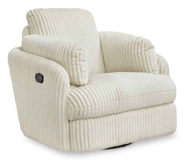 A plush, oversized swivel recliner chair upholstered in thick, vertical cream-colored corduroy fabric. The chair features generously padded armrests, a deep cushioned seat, and an extra-wide backrest with rounded, overstuffed edges for maximum comfort. A black manual reclining lever is visible on the right side (when facing the chair), allowing the footrest to extend. The base is a concealed swivel mechanism with a subtle black edge, enabling 360-degree rotation. The overall design is modern, cozy, and cloud-like, ideal for lounging. The chair is photographed against a clean white background, highlighting its soft texture and inviting appearance.
