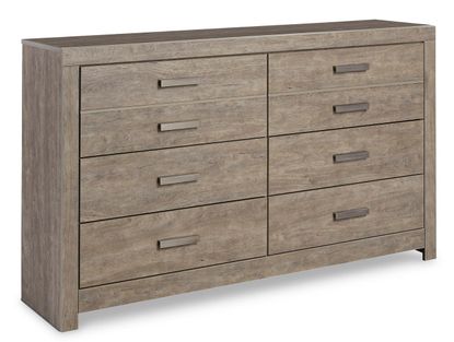 A light gray-brown wooden dresser with eight drawers.  The dresser has a slightly textured, wood-grain appearance.  The drawers all have matching, horizontal, dark gray metal handles.  The dresser has a simple, slightly raised, rectangular frame around the top and bottom edges.